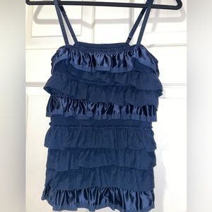 Navy spaghetti strap top.   Satin and ribbon accents.  Adjustable straps.